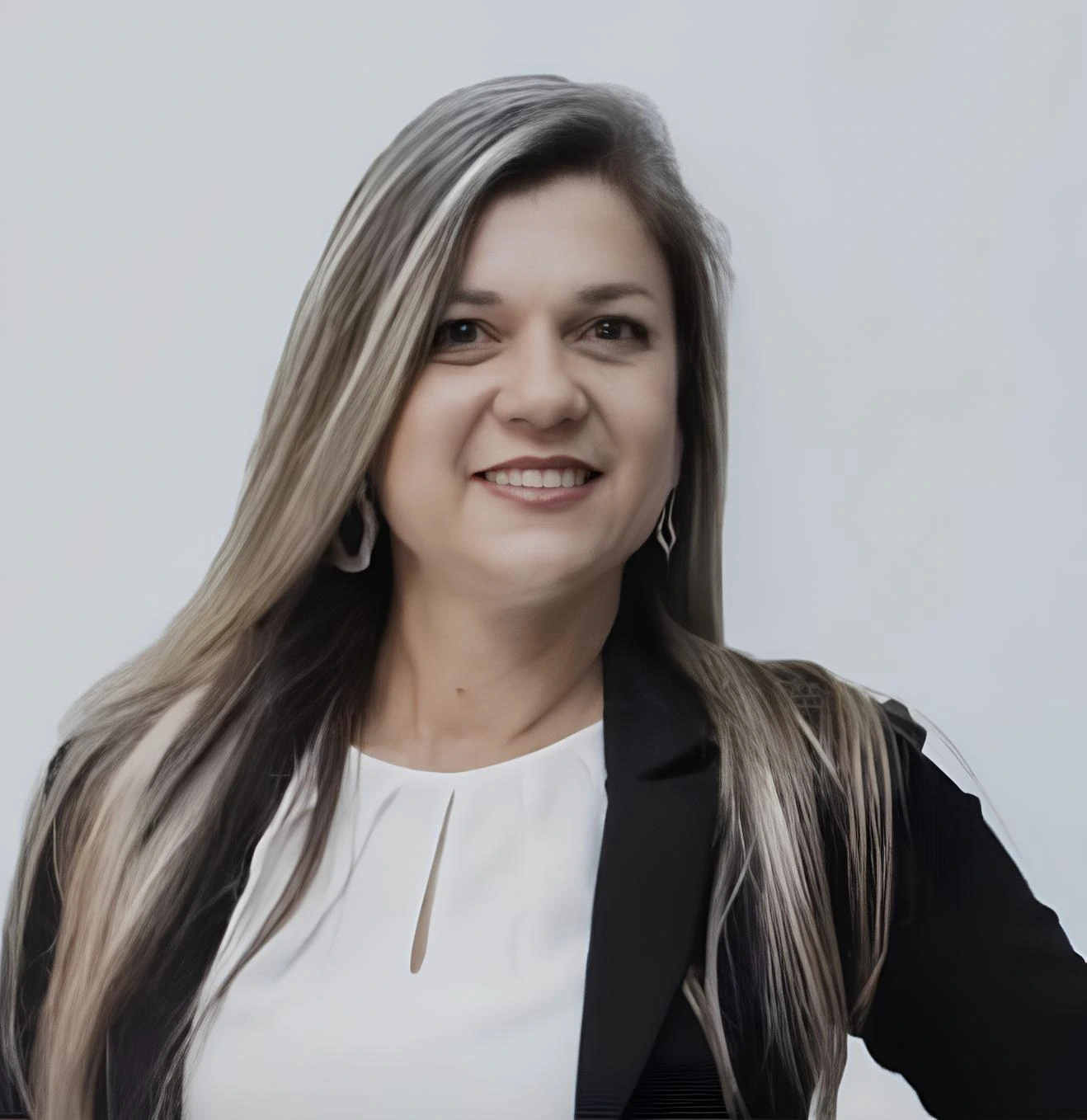 Adriana — Corretora e Sócia